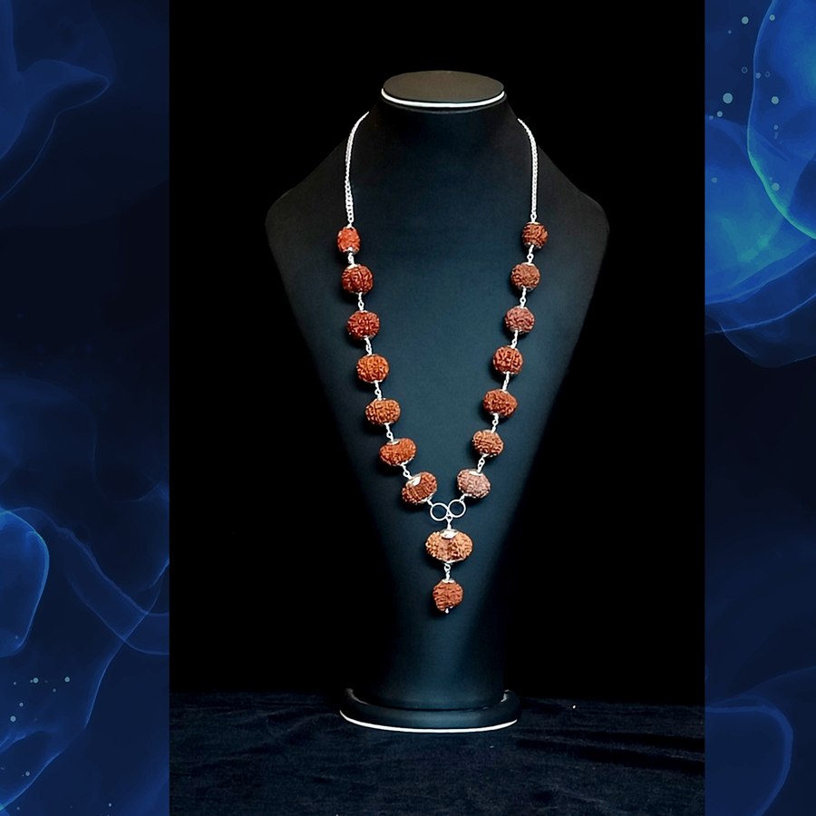 Siddha Mala displayed on a stand